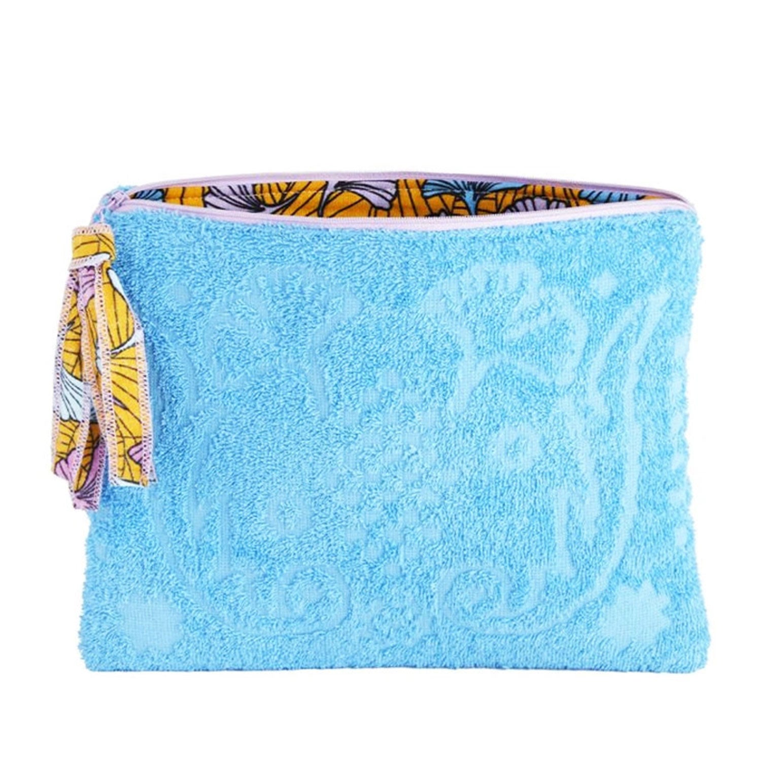 LA ROSÉE makeup bag placed on a bathroom counter